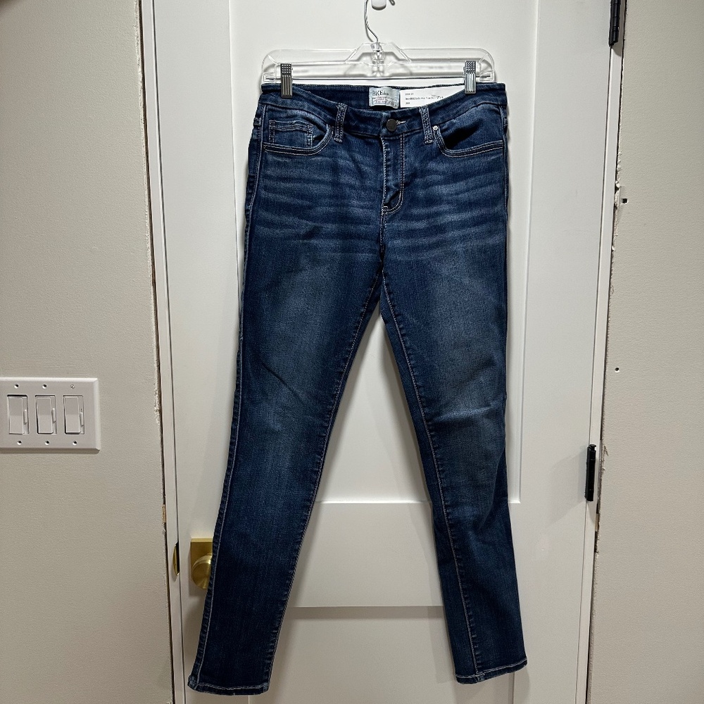100023	Womens	Jean	BKE	Stella Mid Rise Skinny	Dark	30	R	Like New